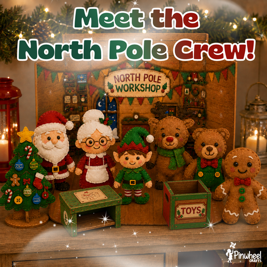 Felt Santa, Mrs. Claus, elf, reindeer, teddy bear, and gingerbread man in the fold-out North Pole Workshop with toy chest