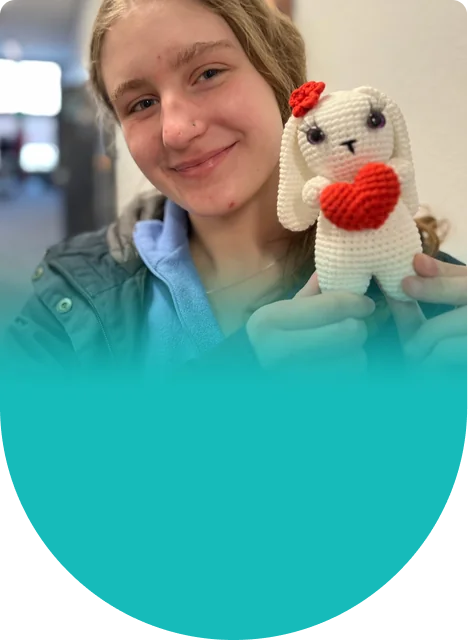 Made to give: a handmade bunny holding a heart for someone you love