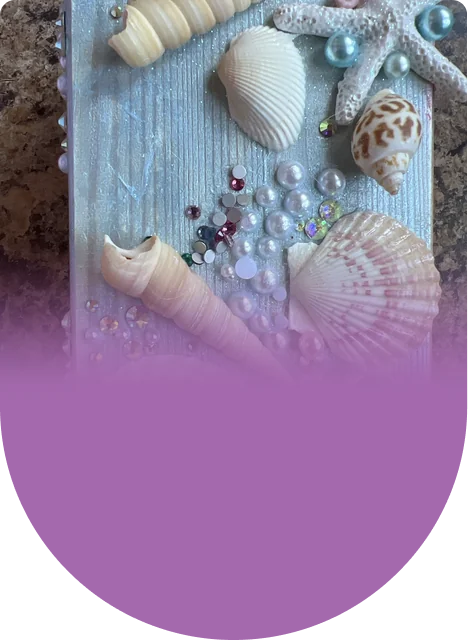 Paint first, let it dry, then build up layer after layer of pearls and shells