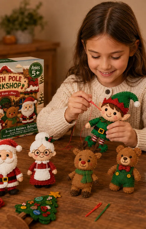 Girl stitching a felt elf beside the North Pole Workshop sewing kit box and finished plush
