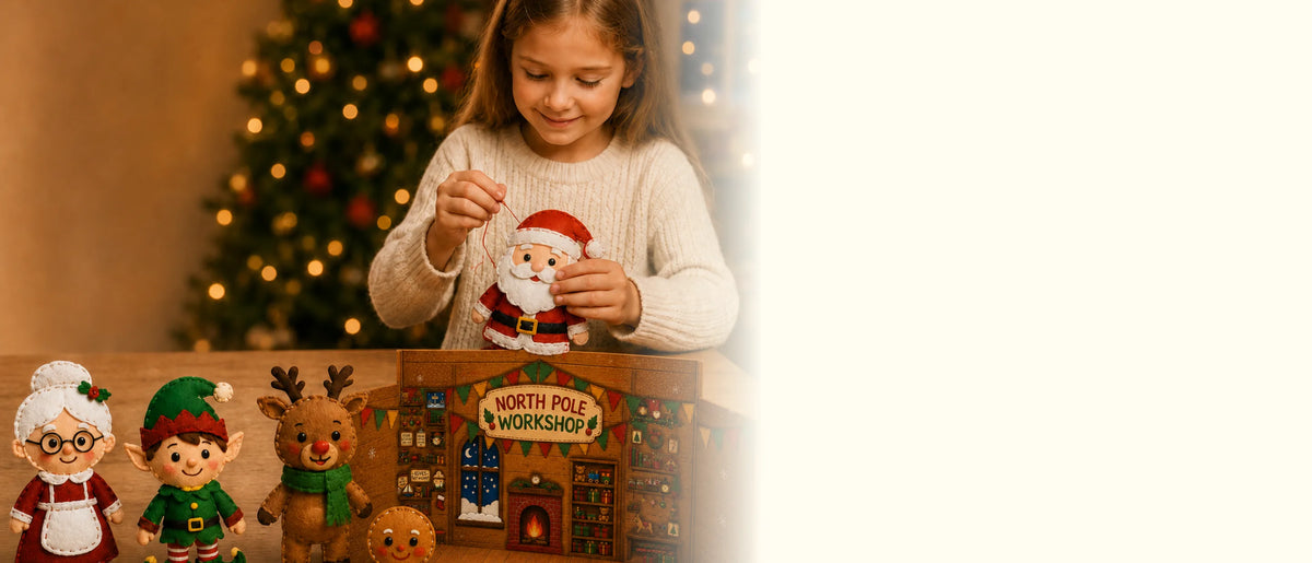 Girl sewing a felt Santa by the Christmas tree with finished plush characters and the North Pole Workshop