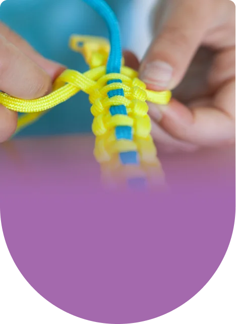 Knot by knot, the bracelet grows until it fits the wrist