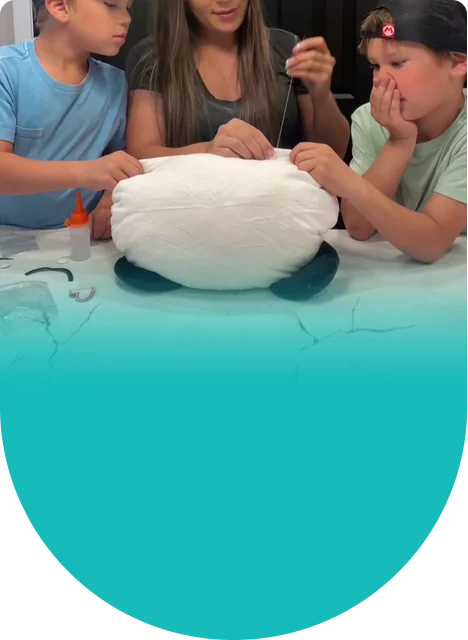 A huggable pillow they made themselves, ready for the bed or the couch