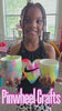 A girl unboxes the kit, swirls paint on water and dips a pot to make a marbled planter