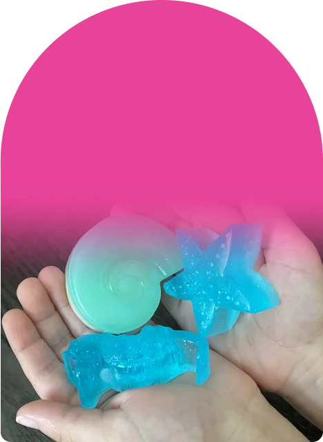 Glittery soaps in sea life, dinosaur, flower, or unicorn shapes