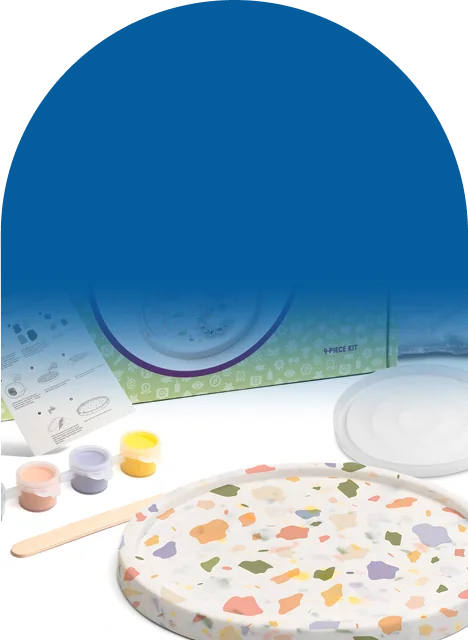 Plaster, mold, paints, stir stick, and sandpaper, all in one box