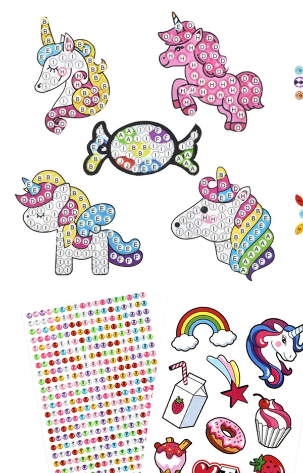 Unicorn diamond painting stickers above a rhinestone sheet and rainbow, donut and cupcake stickers